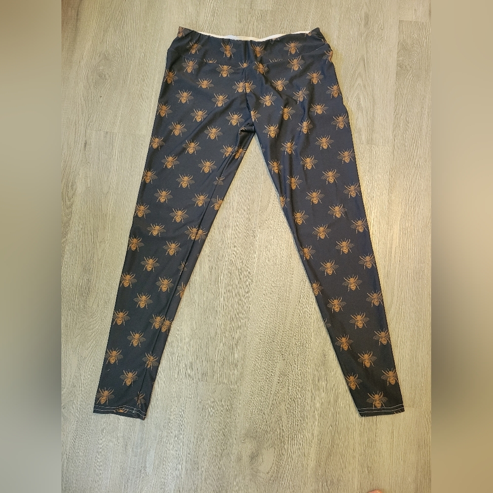 Society6 Black and Gold Bee Leggings